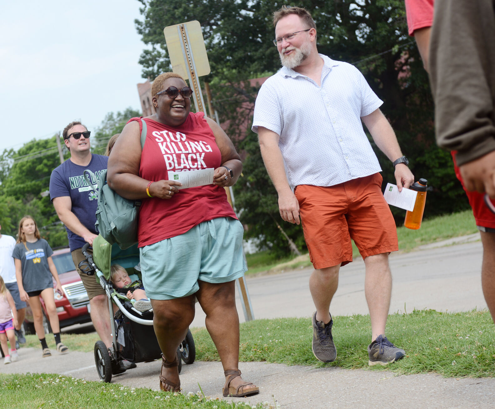 People walk along the African American Heritage Trail